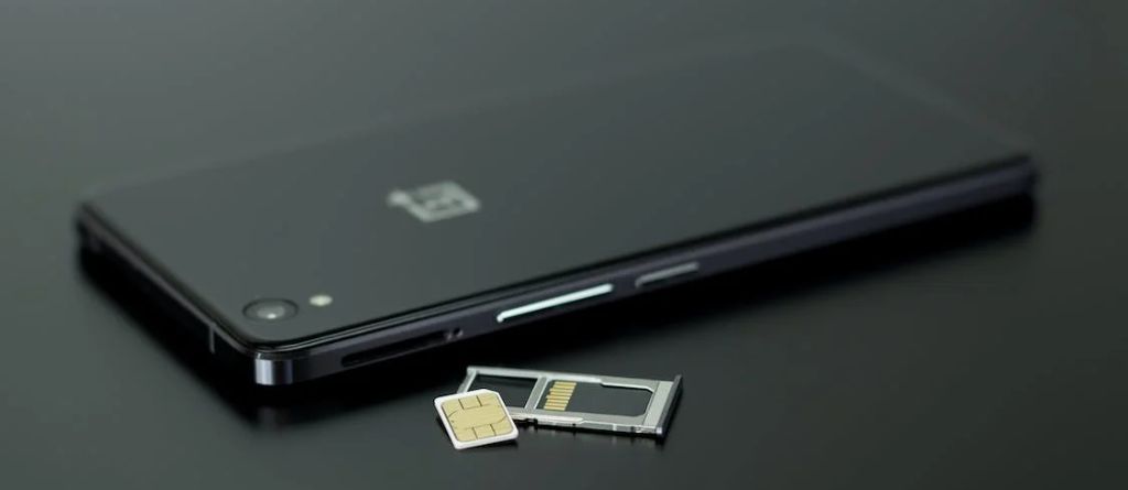 oneplus mobile with a sim slot plat outside